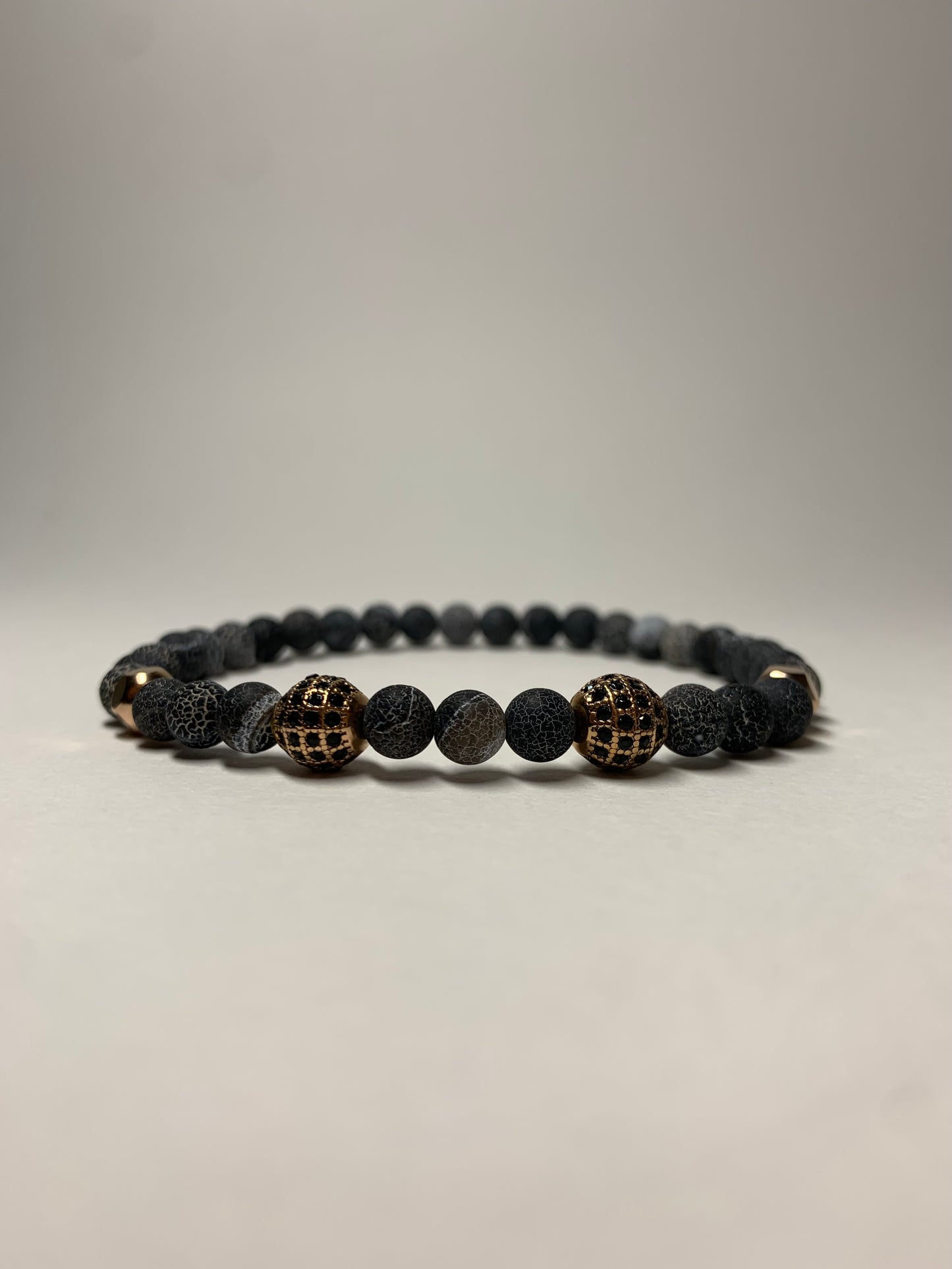 Black Lava Bead Bracelet with Gold-Plated Accents